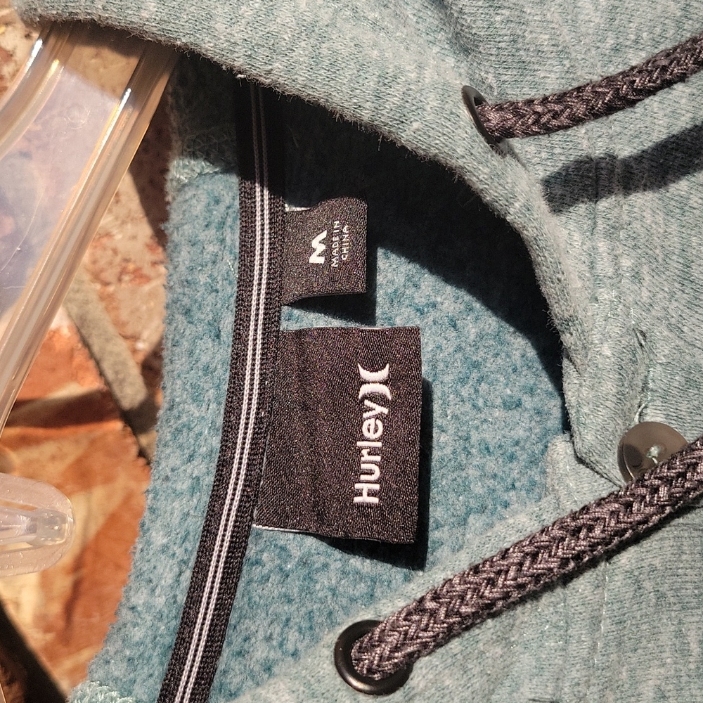 Hurley hoodie. Pale green heather. drawstring and kanga packet. Looks new.